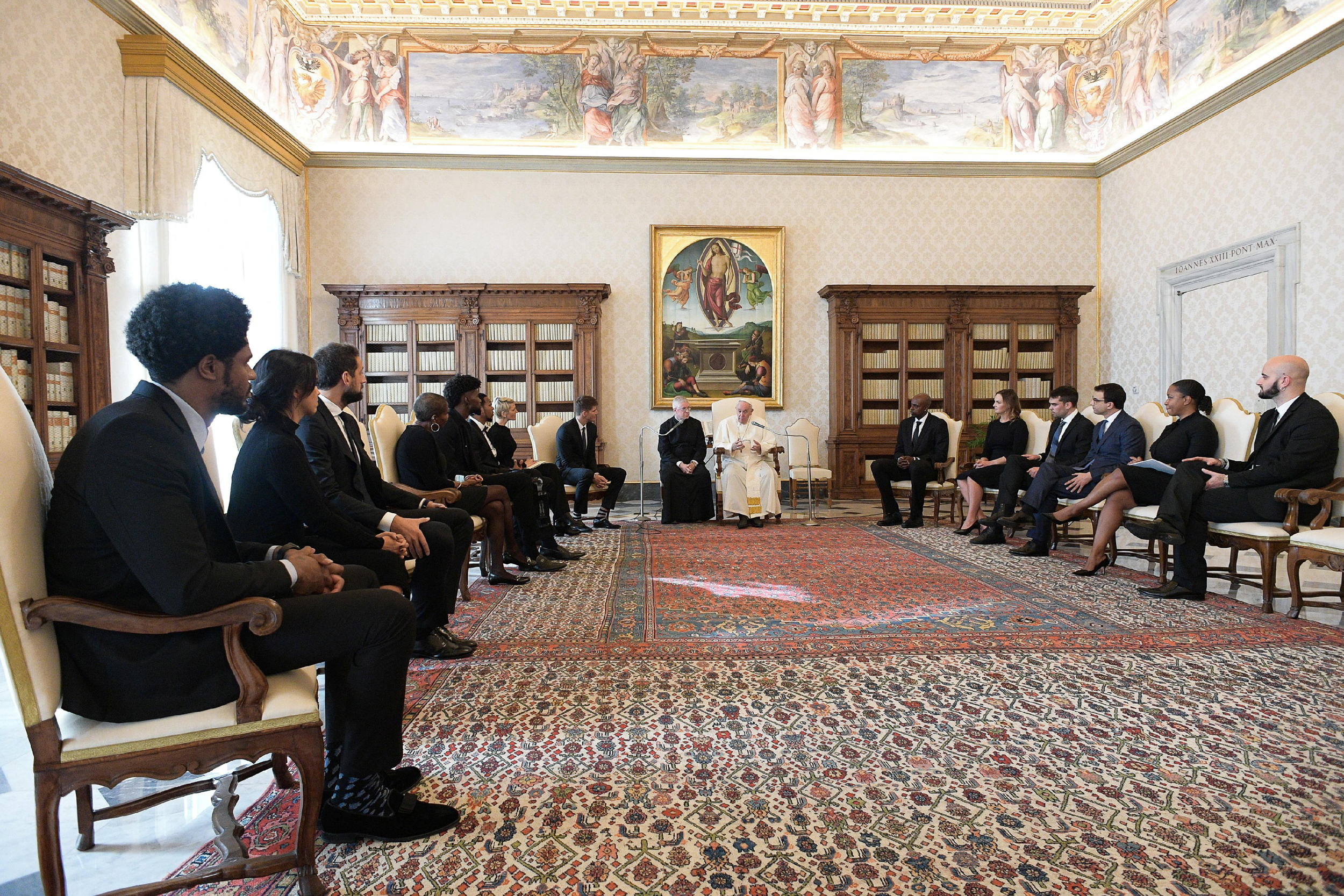 Pope Francis meets a delegation of five NBA players and officials from the National Basketball Players Association at the Vatican November 23, 2020. Vatican Media/Handout via REUTERS THIS IMAGE HAS BEEN SUPPLIED BY A THIRD PARTY.