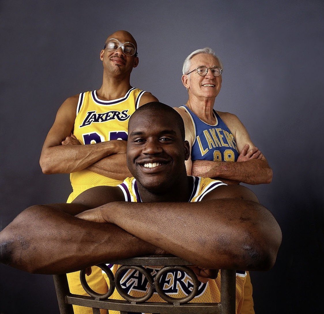 LOS ANGELES - 1996: Shaquille O'Neal #34, Kareem Abdul Jabbar #33 and George Mikan #88, three generations of great Los Angeles Lakers centers pose for a portrait in Los Angeles, California. NOTE TO USER: User expressly acknowledges and agrees that, by downloading and/or using this Photograph, User is consenting to the terms and conditions of the Getty Images License Agreement. (Photo By Peter Read Miller/NBAE via Getty Images)